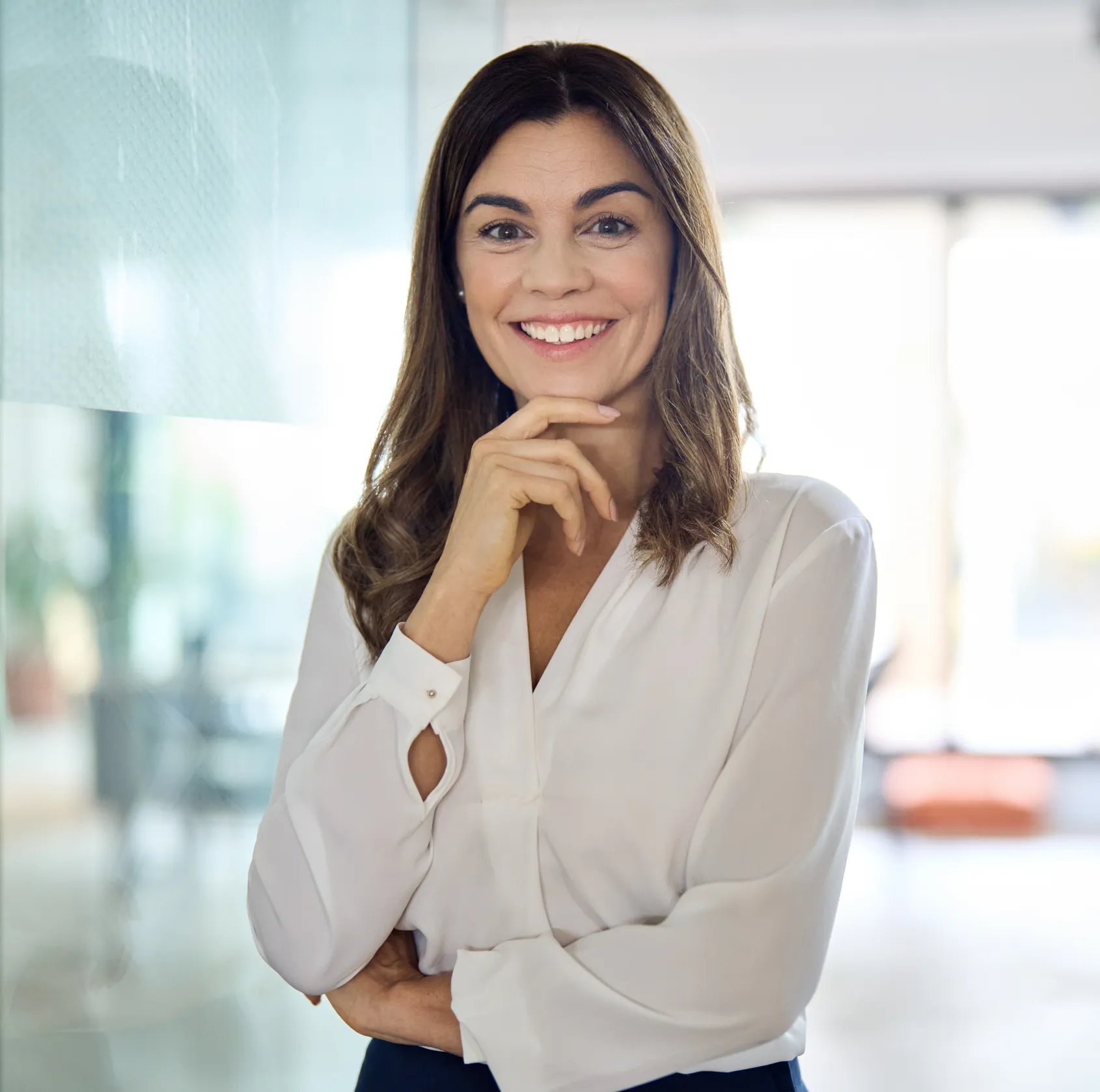 A confident woman smiling at Spur Line Dental