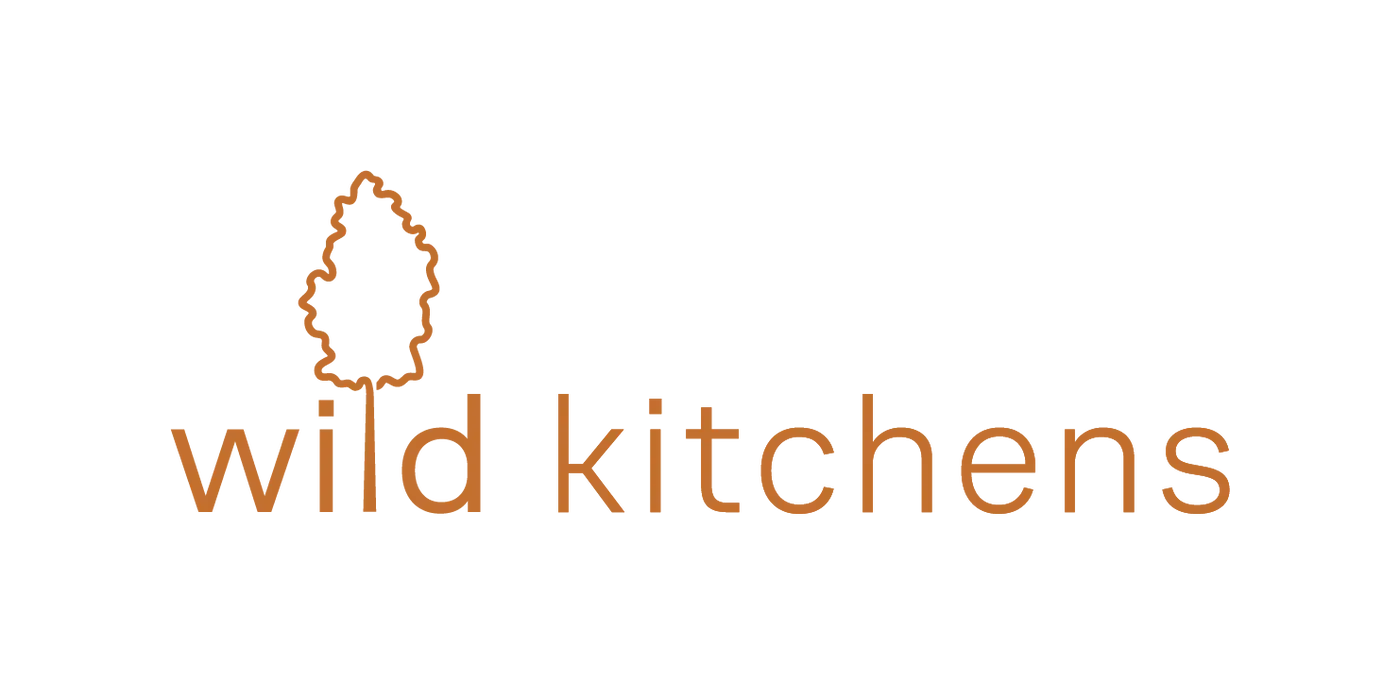 Orange logo of Wild Kitchens