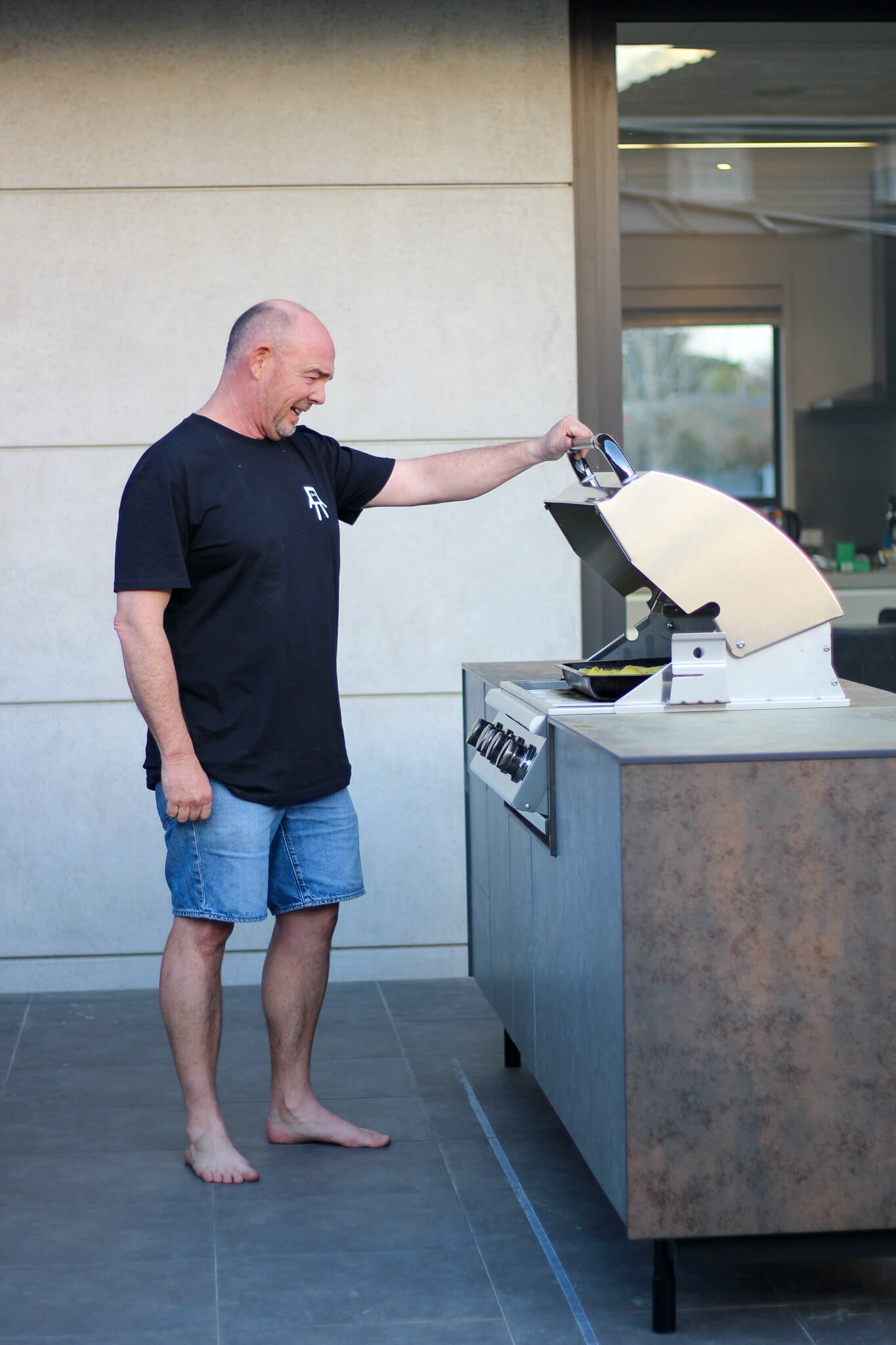 The Cubb By Wild Kitchens with a inbuilt Weber. Sirius Benchtop and Graphite Cabinet fronts