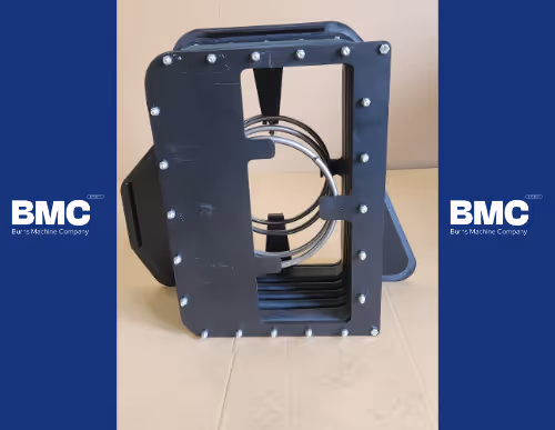CNC machined Roots blower end plate with precision fasteners by Burns Machine Company (BMC).