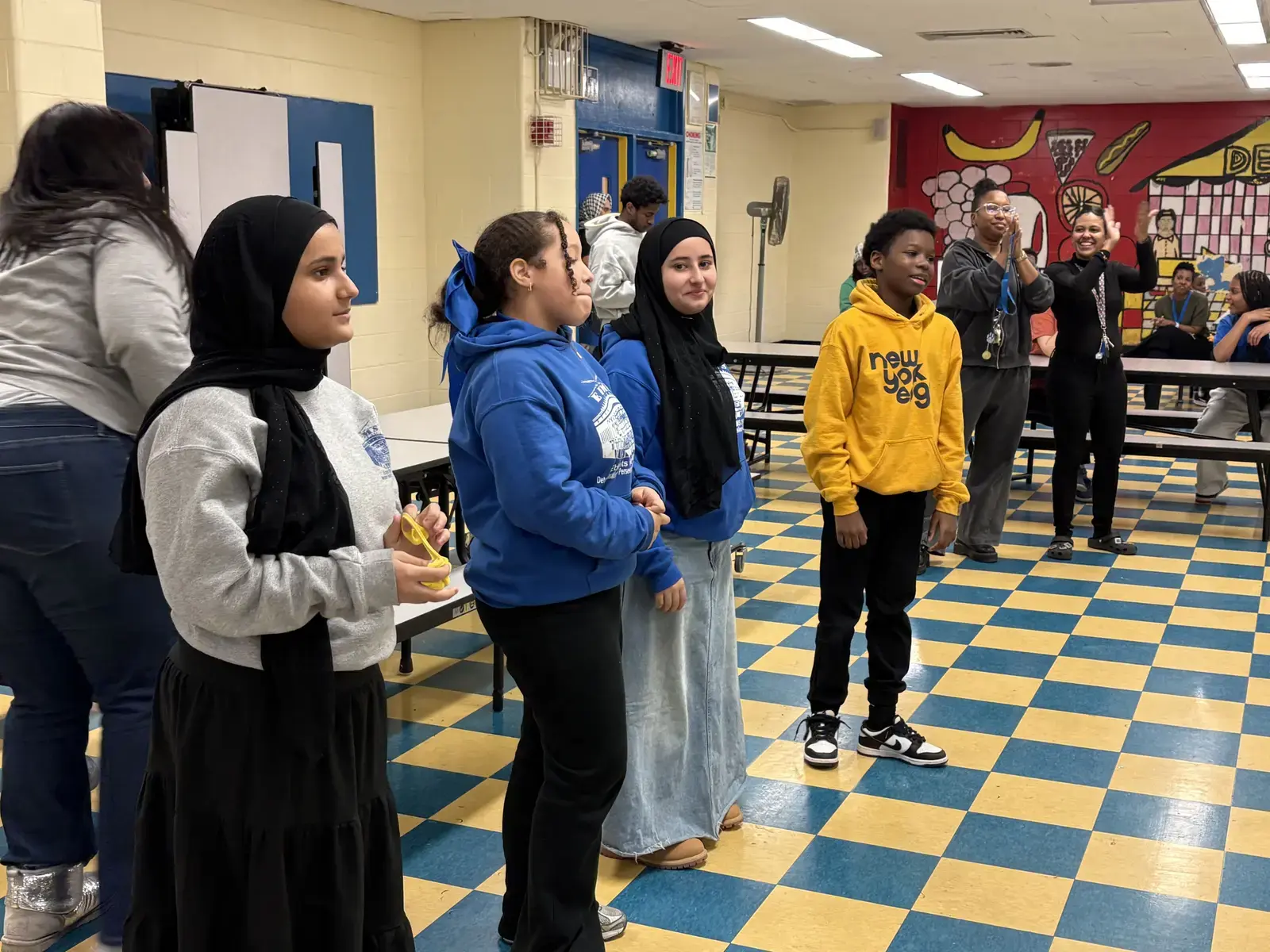 Students gathered together in school cafeteria during an event