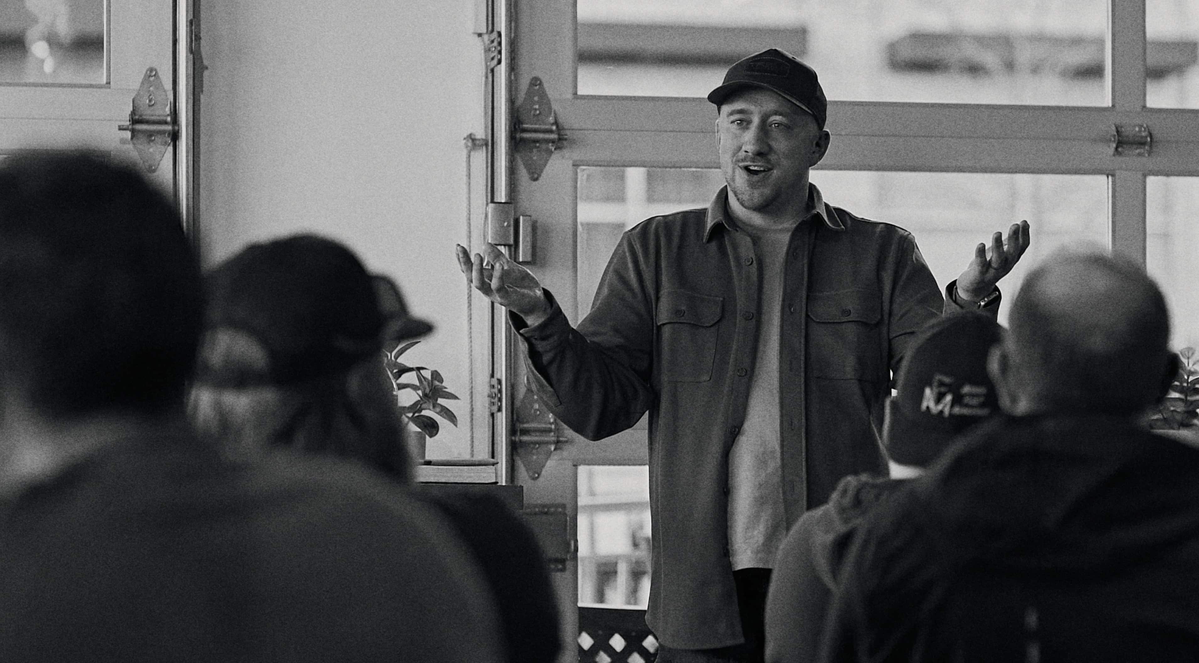 Josh preaching at Monk & Mongoose.