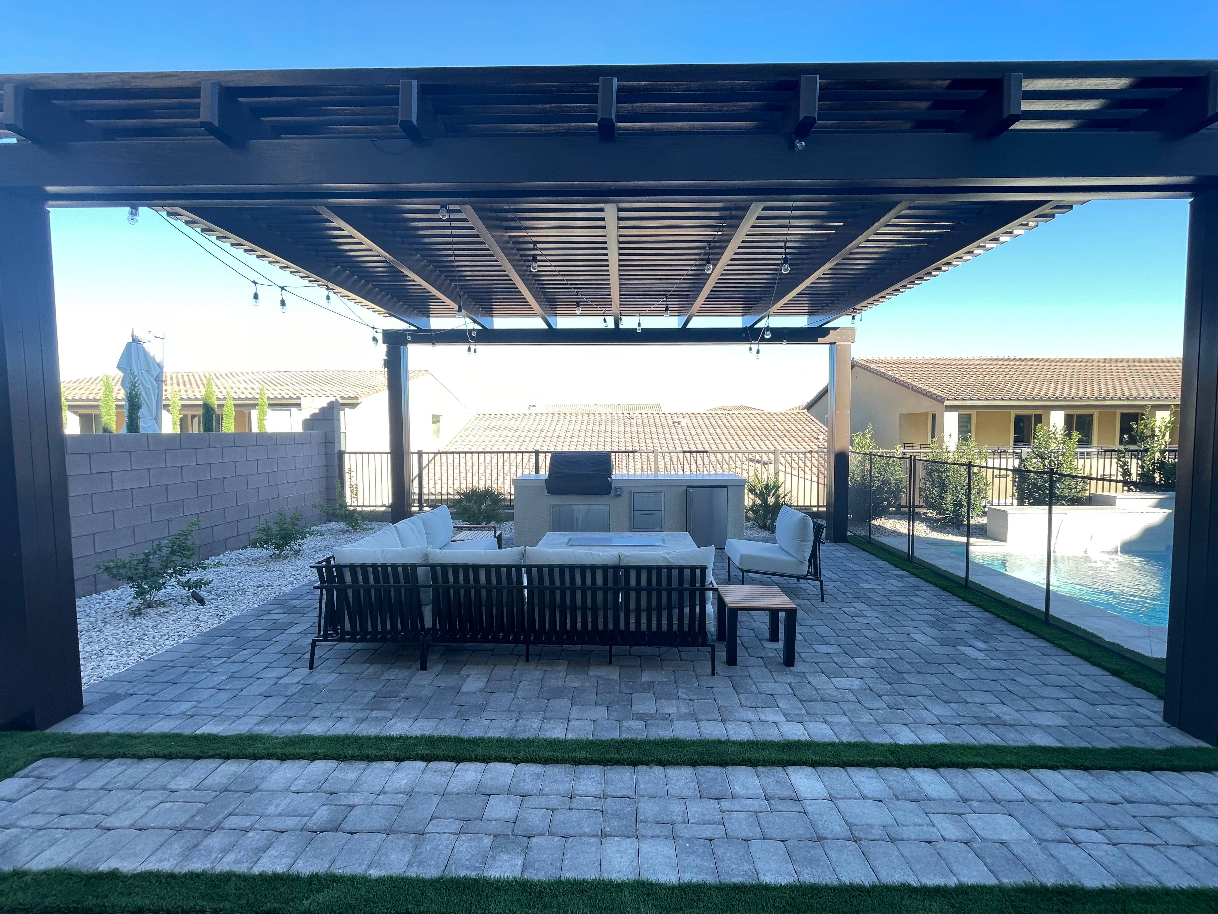 Lush garden landscape with winding stone pathway and vibrant flower beds