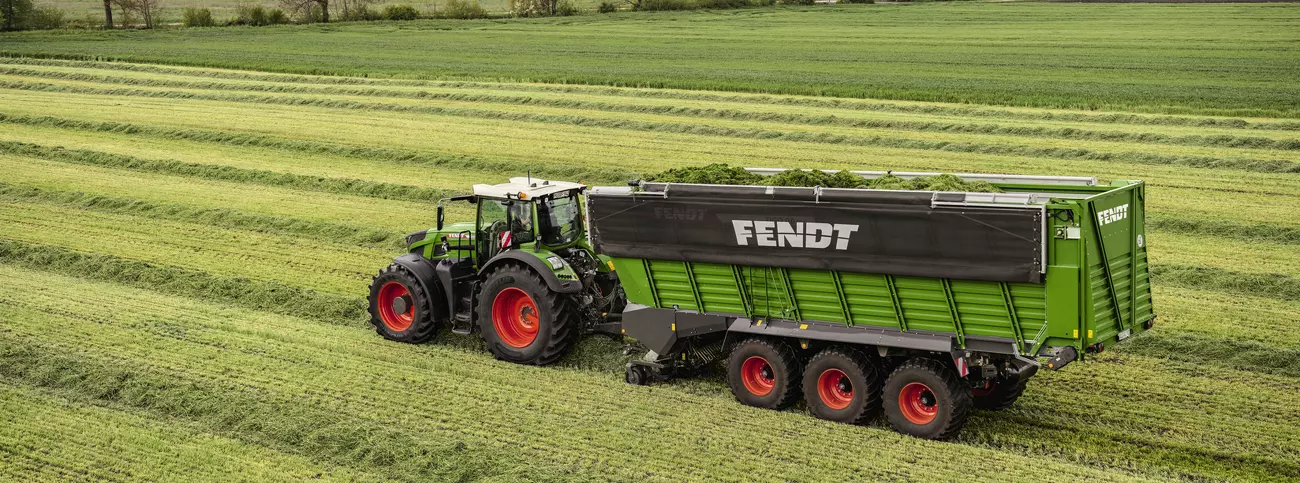 Fendt farm tractor towing a trailer