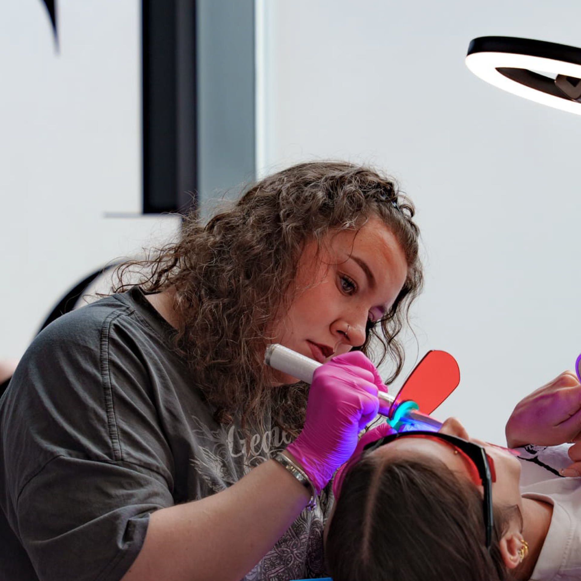 Casey Toms, tattoo artist and tooth gem technician at Tenko Tattoo in Preston