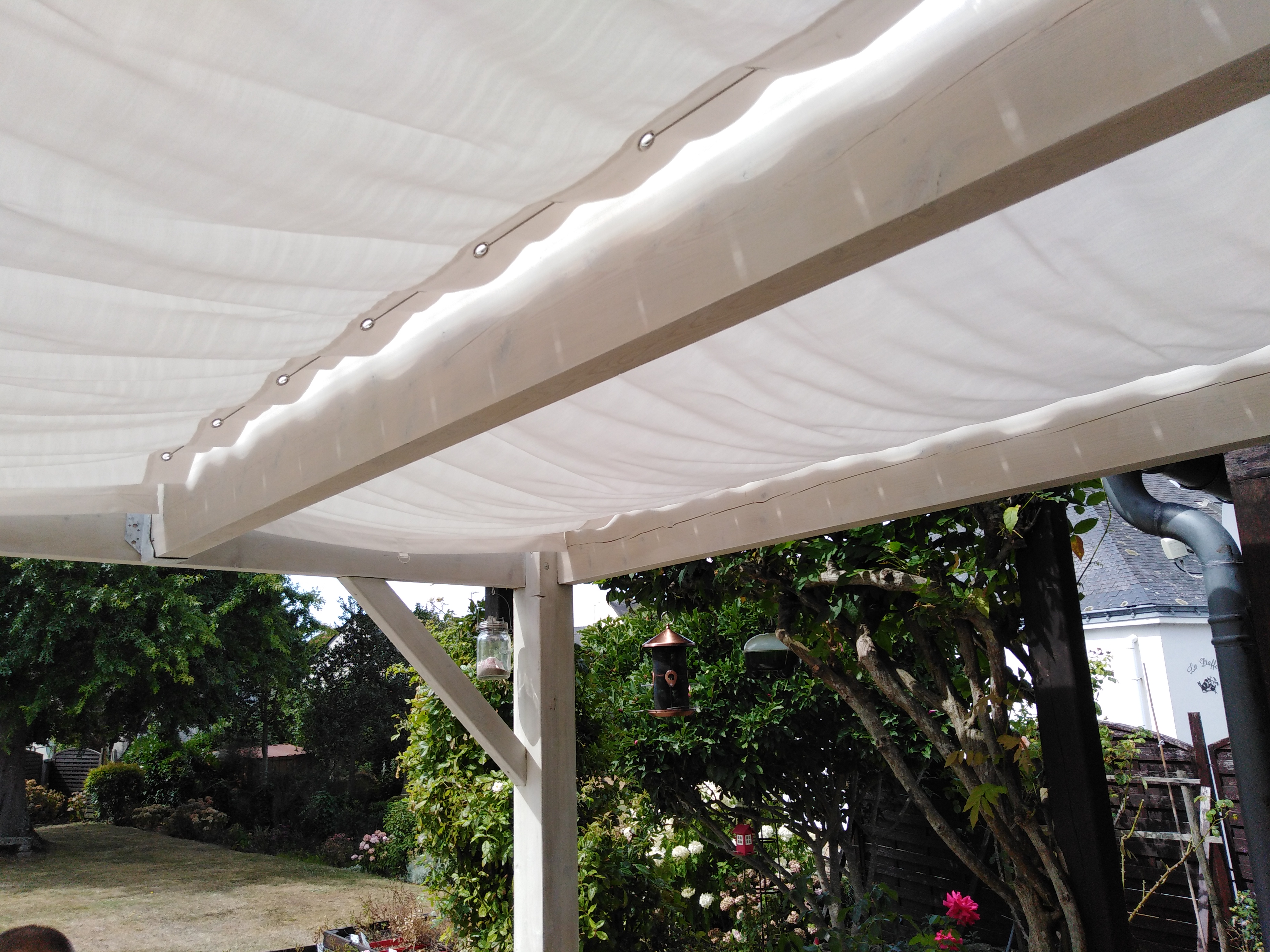 Pergola aec toile d'ombrage