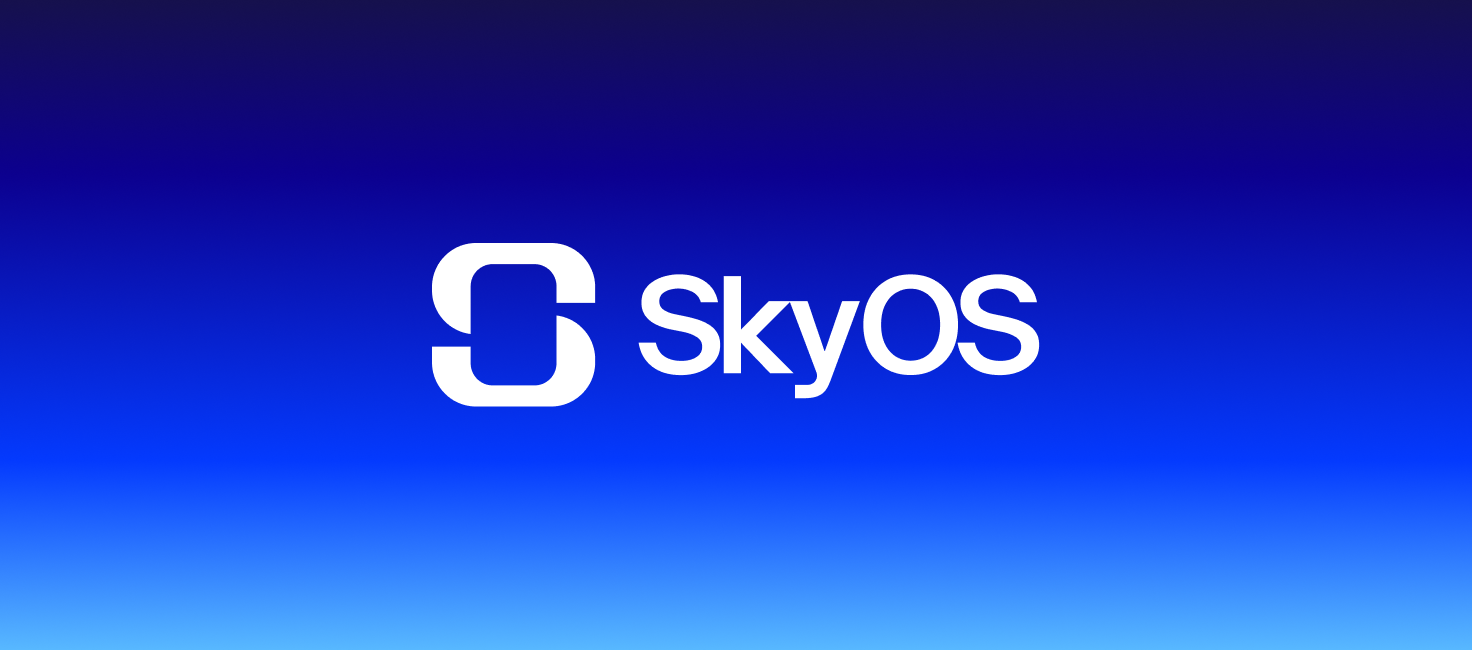 Person using the SkyOS mobile app at a desk with a notebook, coffee, and laptop nearby