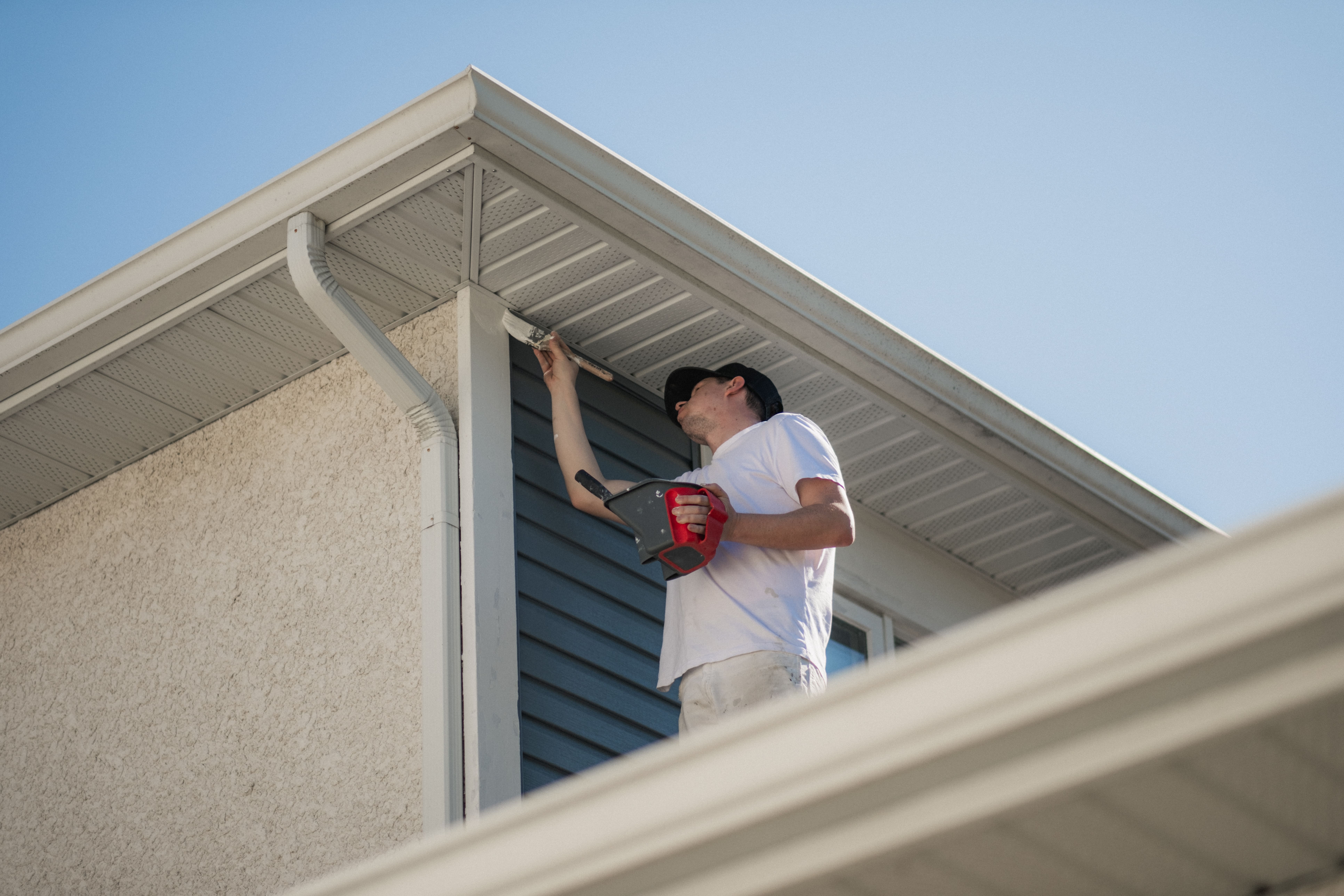 Exterior house painting, wooden siding painting