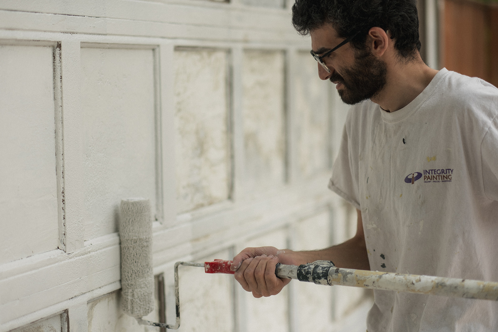 A complete exterior stucco repaint by Integrity Painting, featuring a modern grey finish that provides a fresh, updated look and superior weather protection.