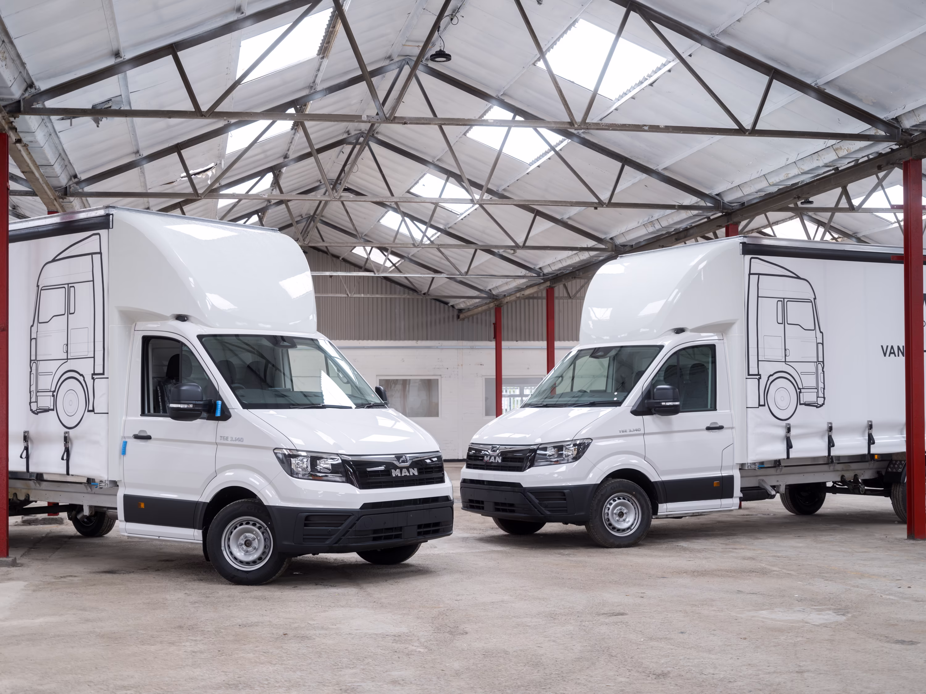 The front of two White Logistics vans built by WCC