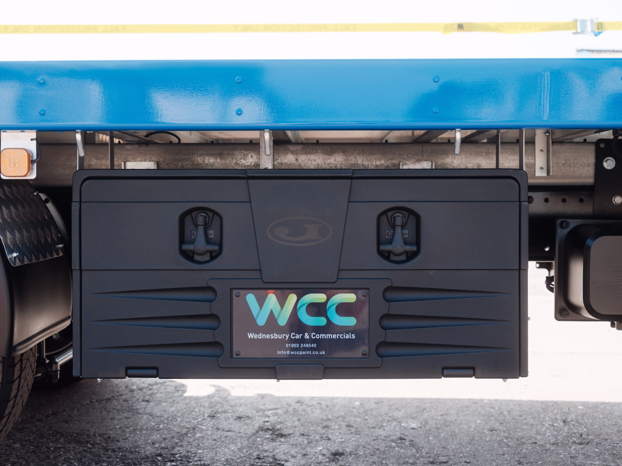 A branded WCC tool box on a finished MAN build. 