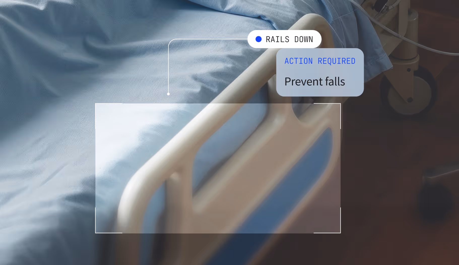 Patient resting on bed while AINA tracks rail down