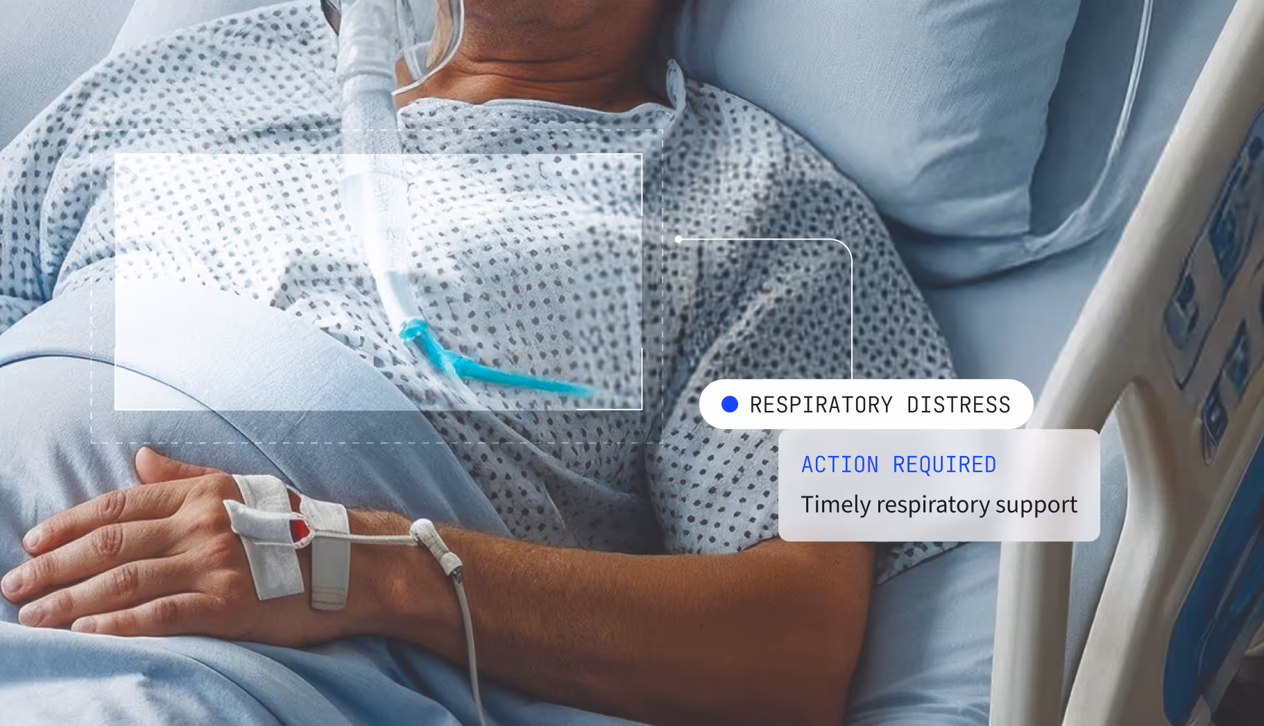 A man laying in a hospital bed wearing a breathing apparatus.