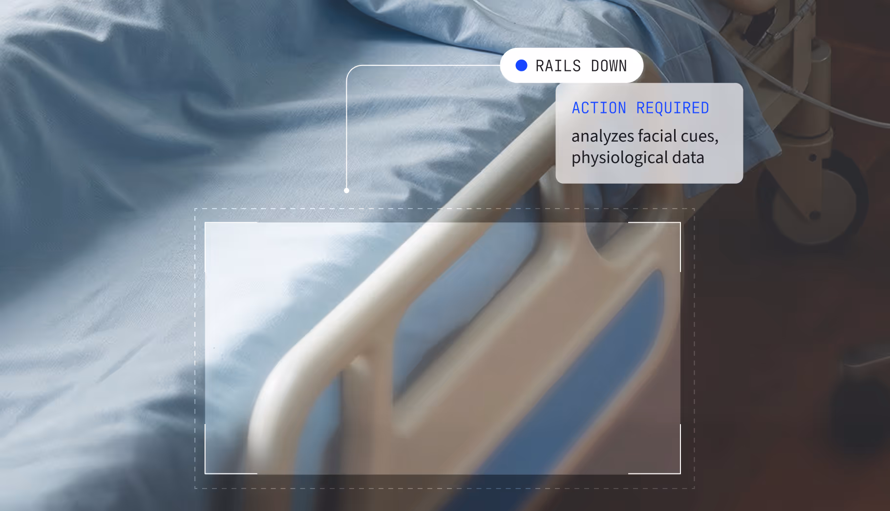 A hospital bed with a blue sheet on it.