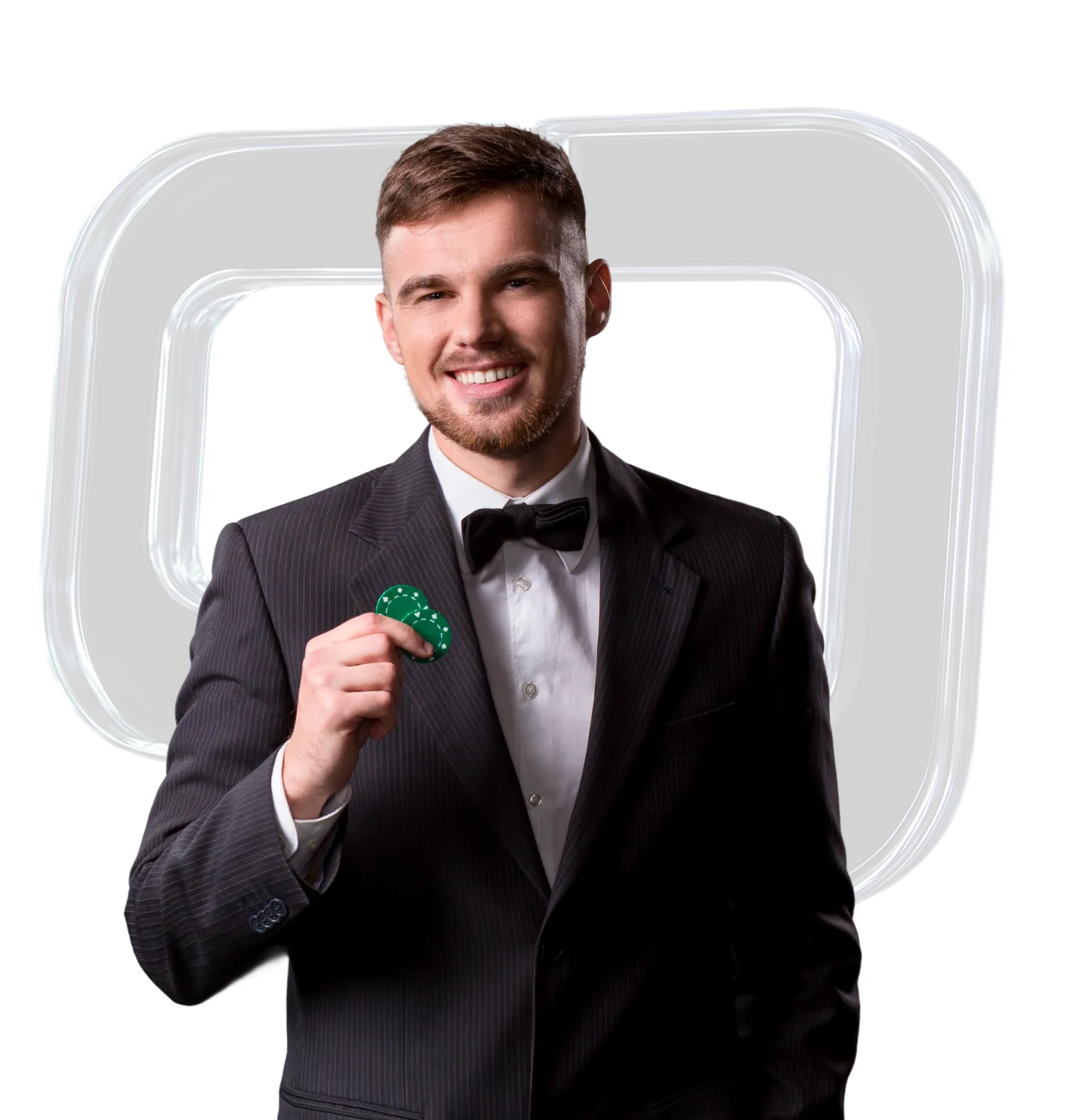 Smiling man in a black suit and bow tie holding two green poker chips.
