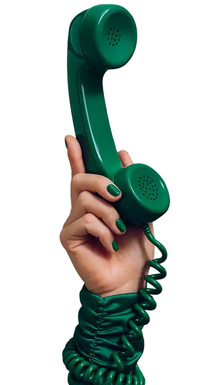 Forleap Marketing. Hand with green nail polish holding a dark green retro telephone handset with a coiled cord.