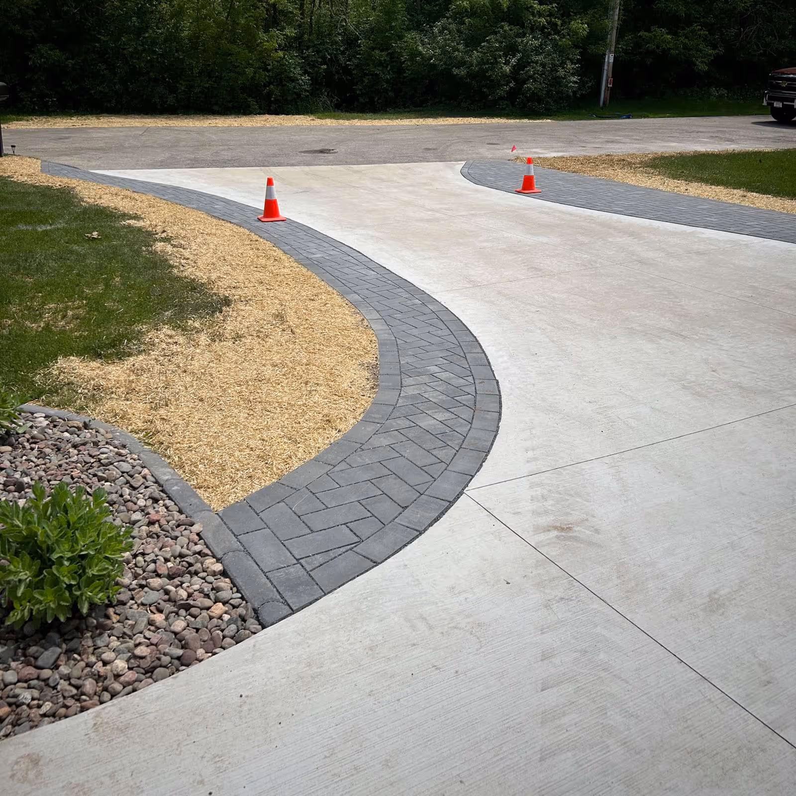 Durable paver walkway project to front entry by Avid Landscapes