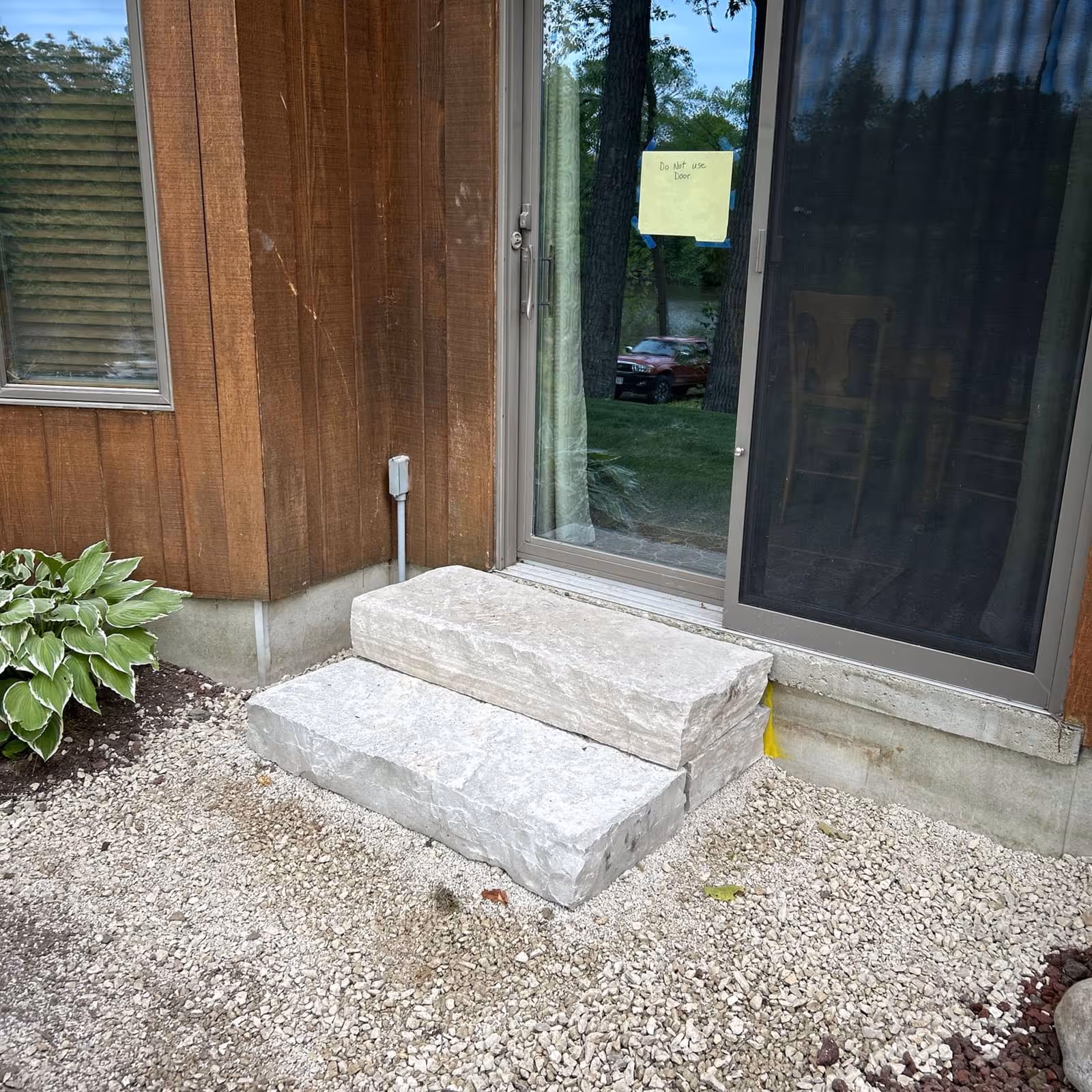 Back porch installation Fond du Lac WI — Avid Landscapes porch build connecting to paver patio