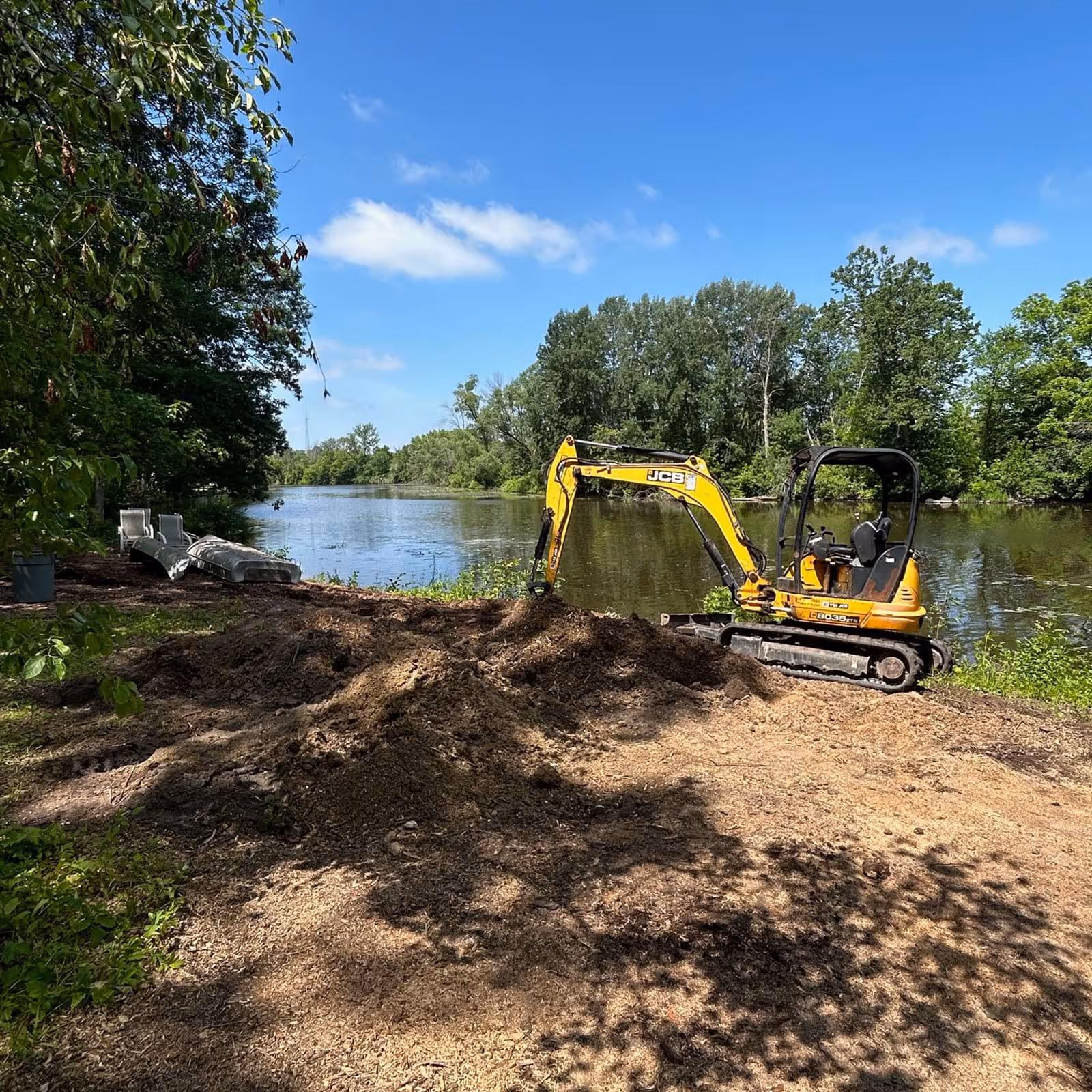 Avid Landscapes Equipment plate compactor prepping paver base