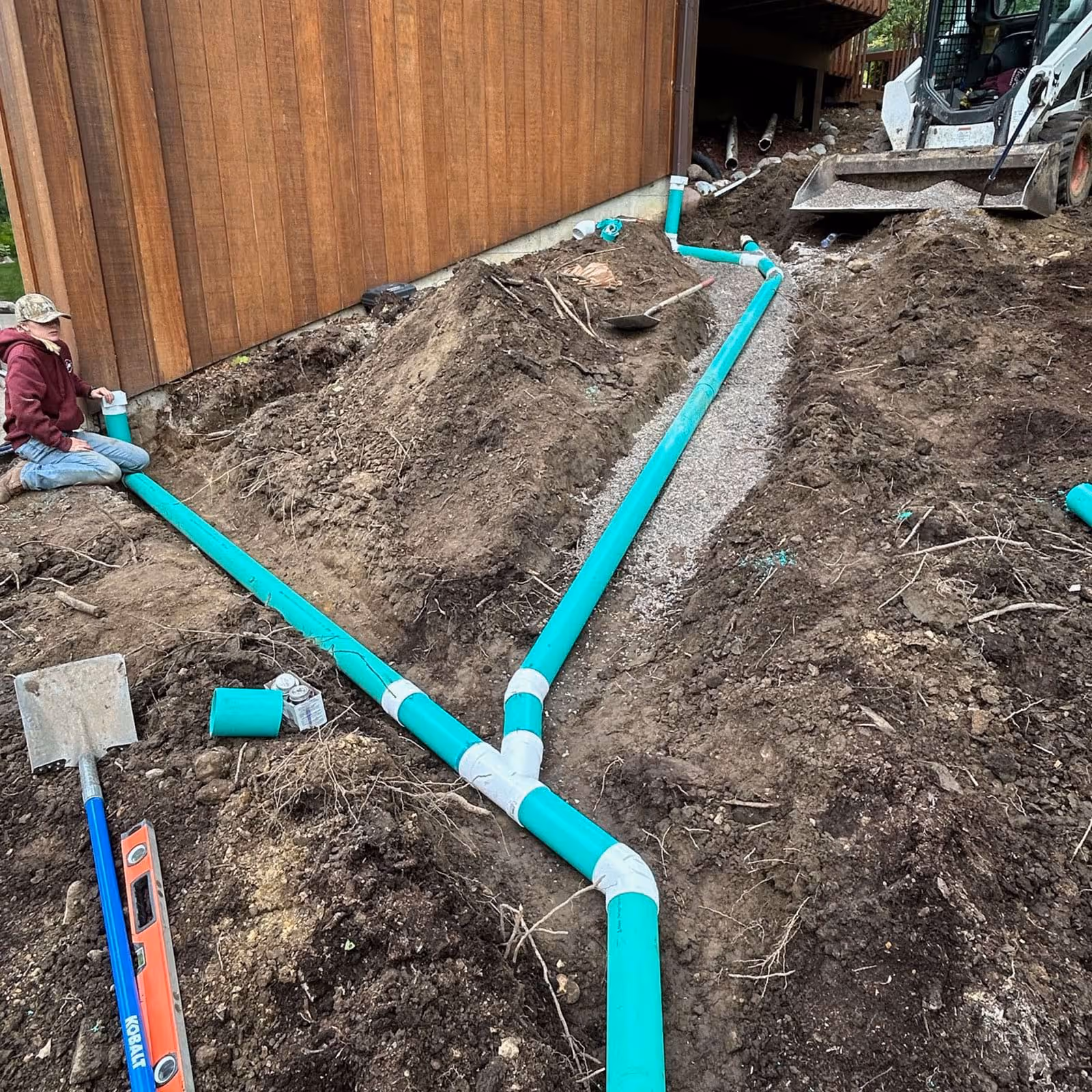 French drain installation and grading for proper yard drainage — Wisconsin