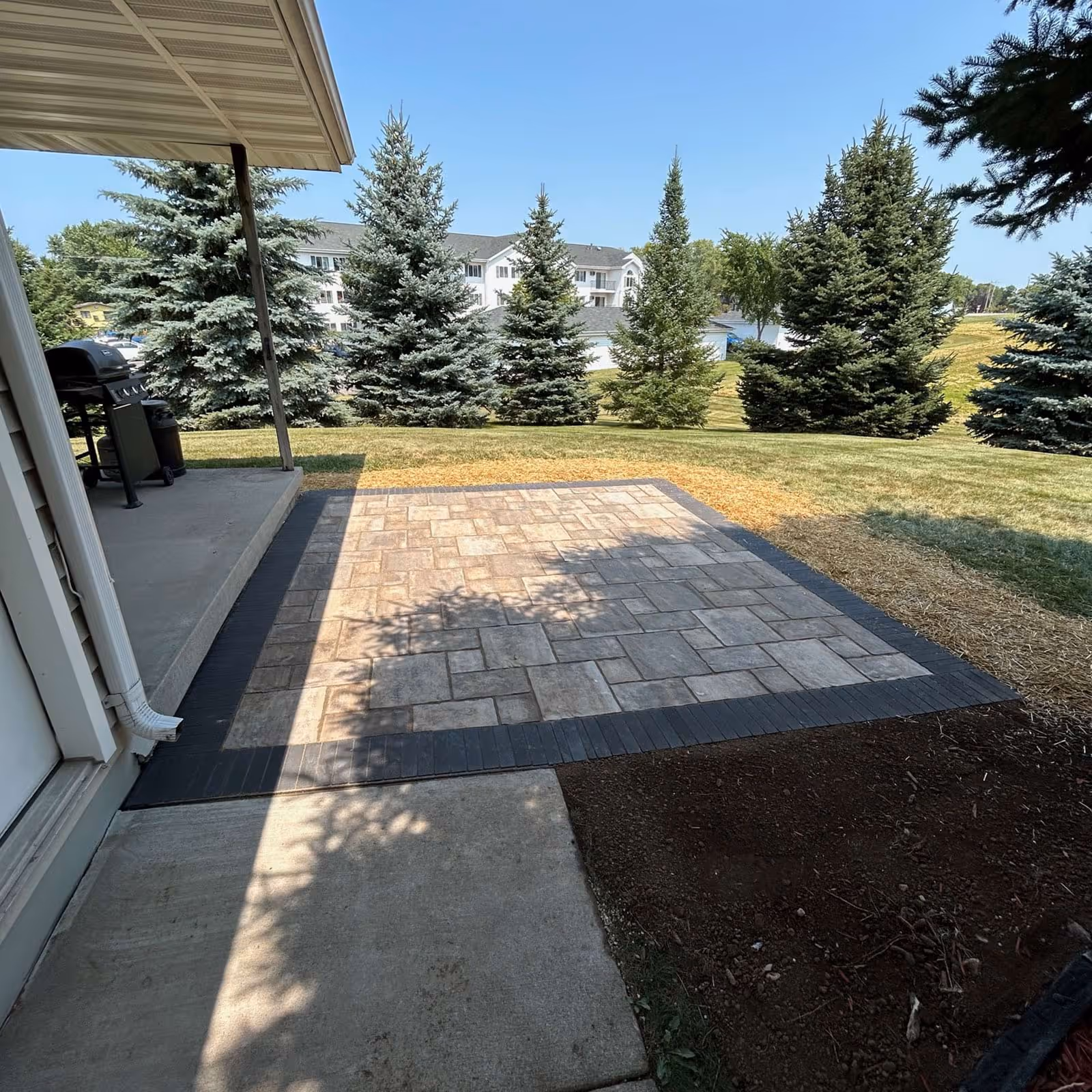 Custom paver patio install Fond du Lac — Avid Landscapes near me

