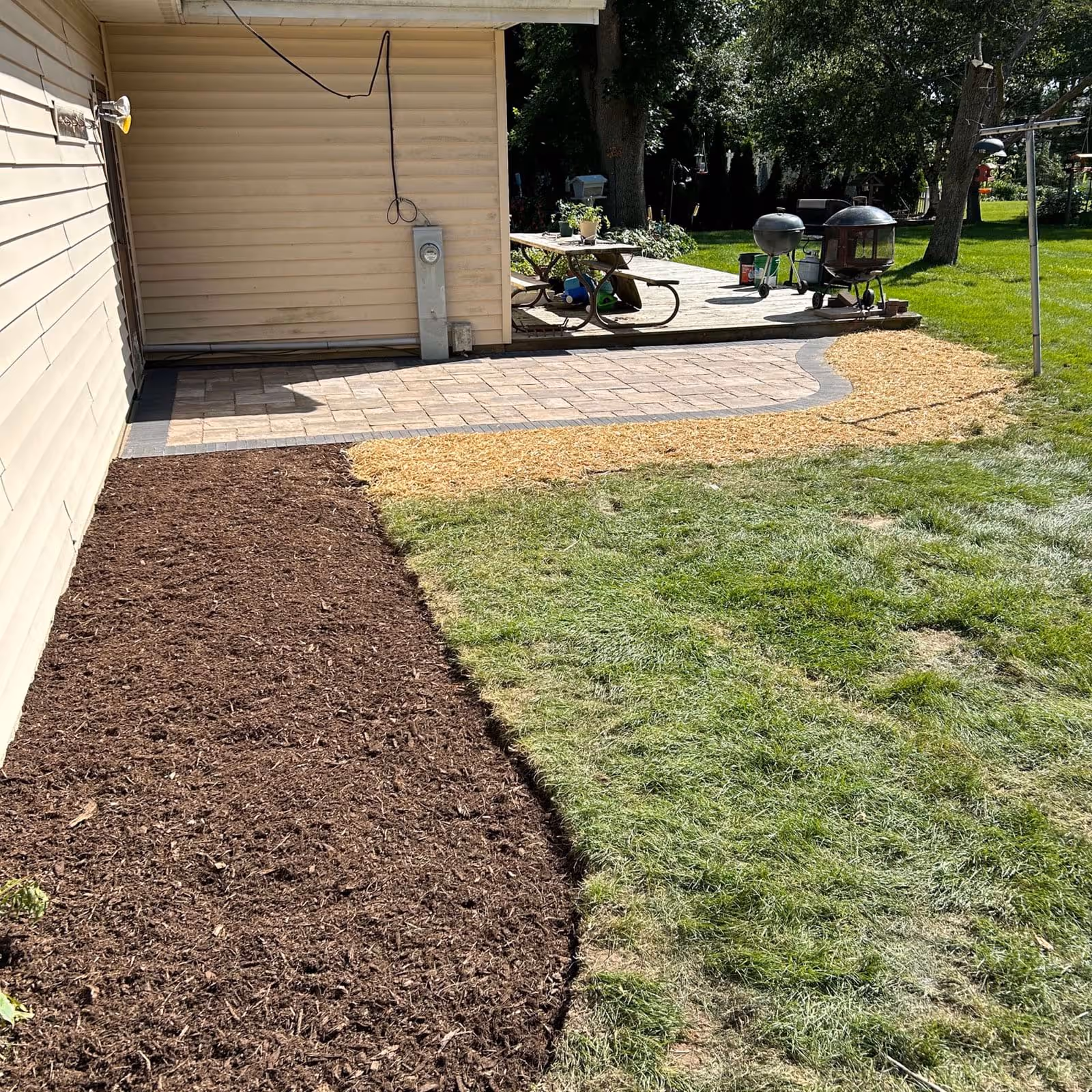 Matuszewski residence patio yard view — Avid Landscapes paver patio & lawn, Fond du Lac WI