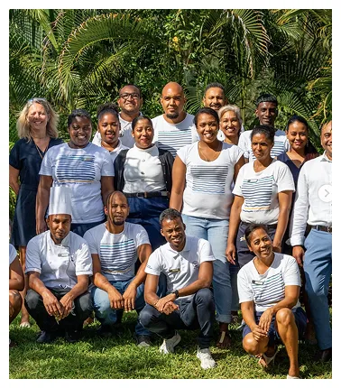Photo of the smiling MJ Holidays team meeting in Mauritius.