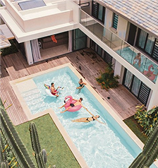 Aerial view of a private pool surrounded by greenery in Mauritius with MJ Holidays.