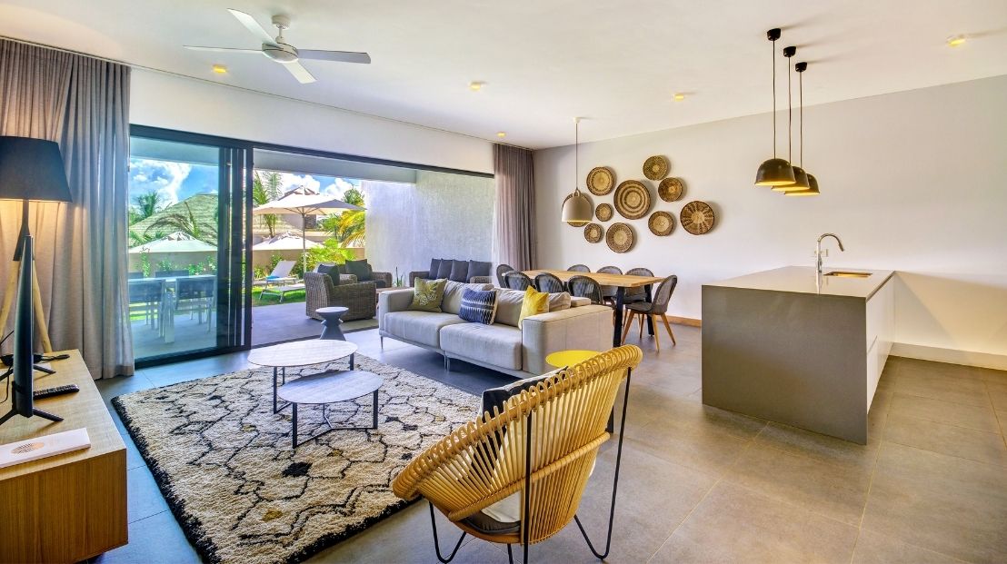 Spacious living room of a refined villa, combining contemporary comfort and tropical charm with MJ Holidays.