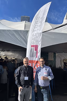 Grant and partner at event.