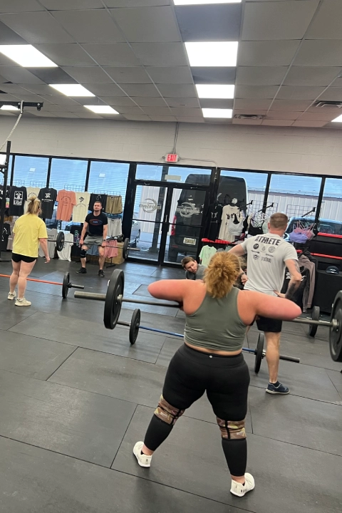 CrossFit Empire South gym interior in Maryville, TN, featuring group classes and workout equipment.