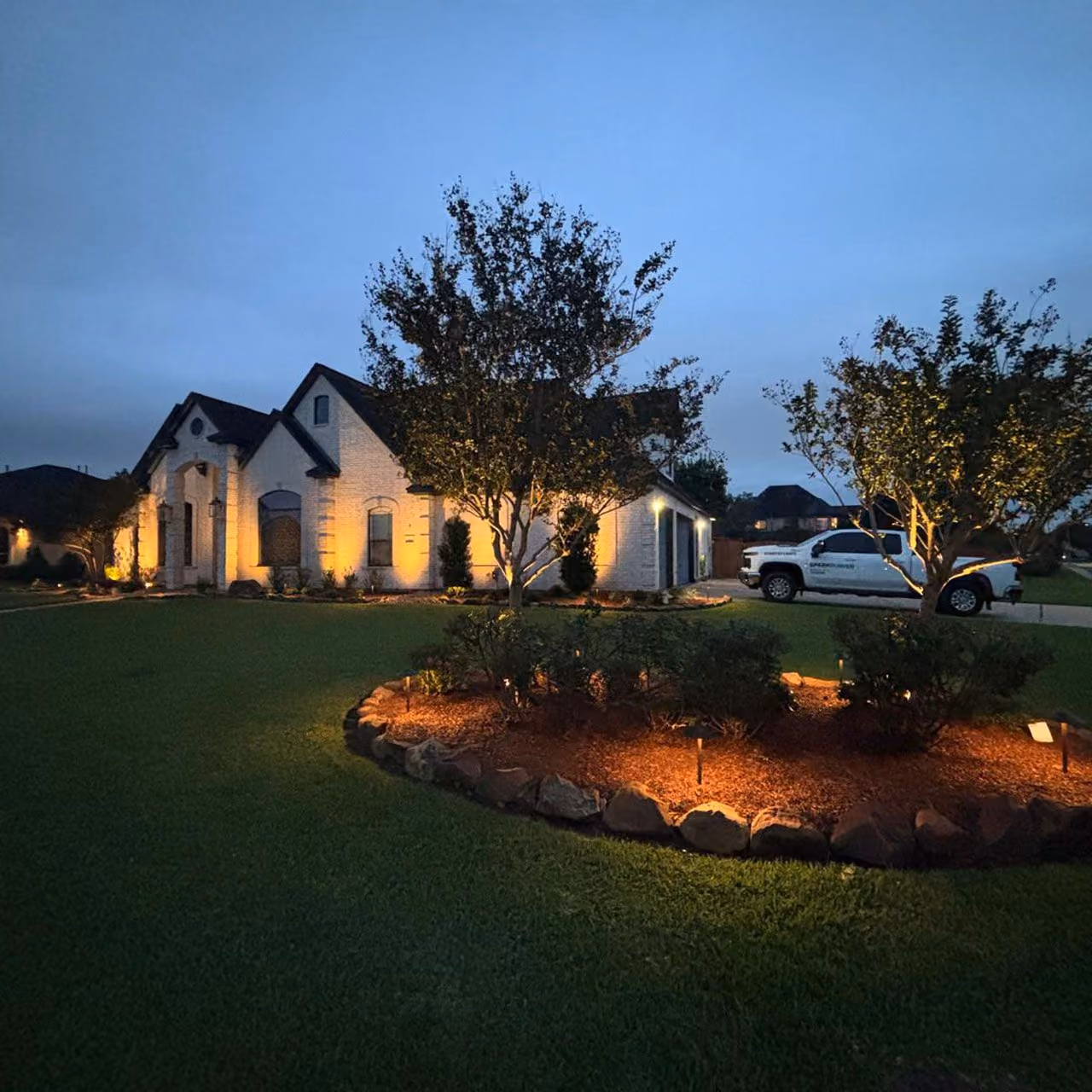 Highland Lawn & Landscaping installing professional landscape lighting in Brazoria County