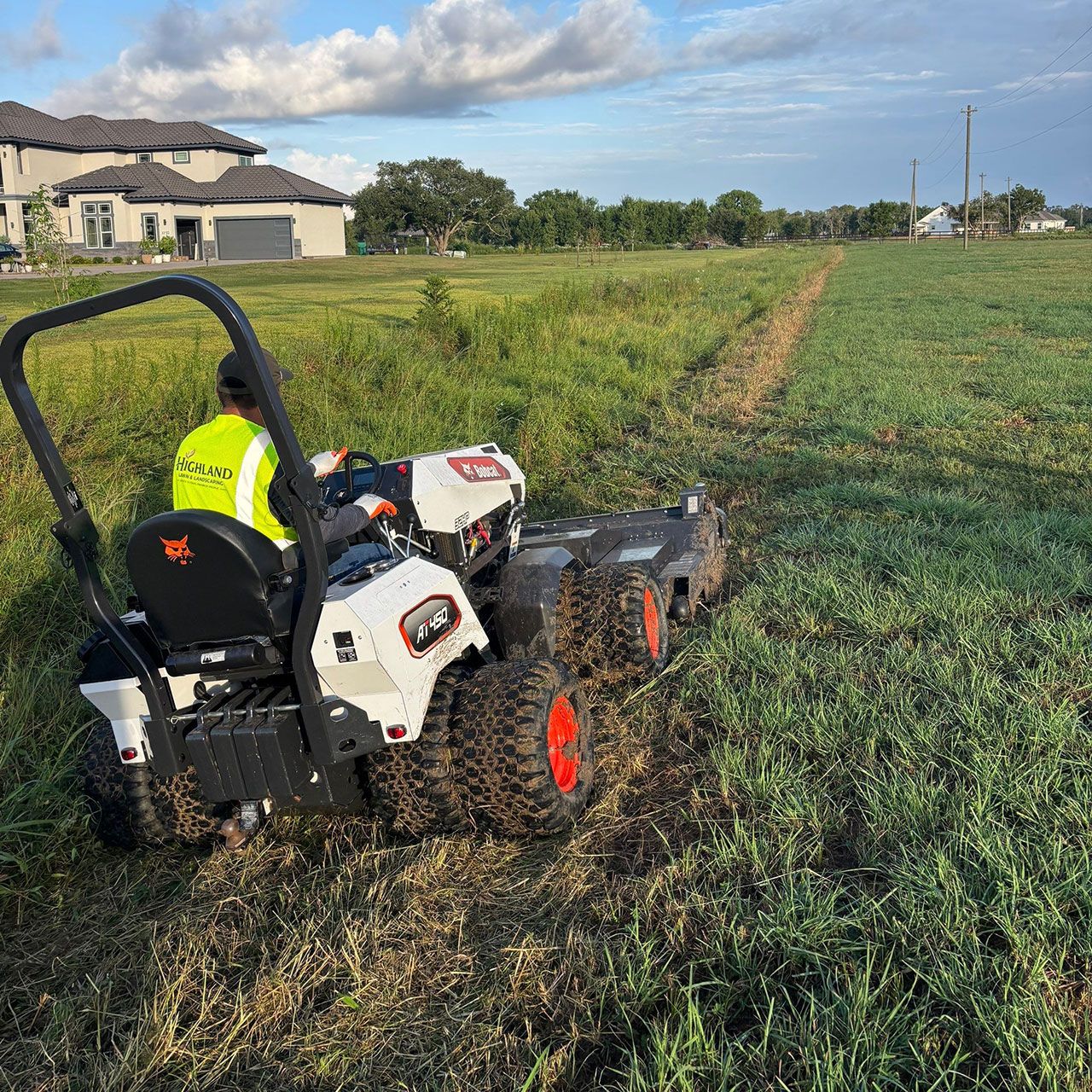 Slope, Brush, and unkempt property maintenance by Highland Lawn and Landscaping.