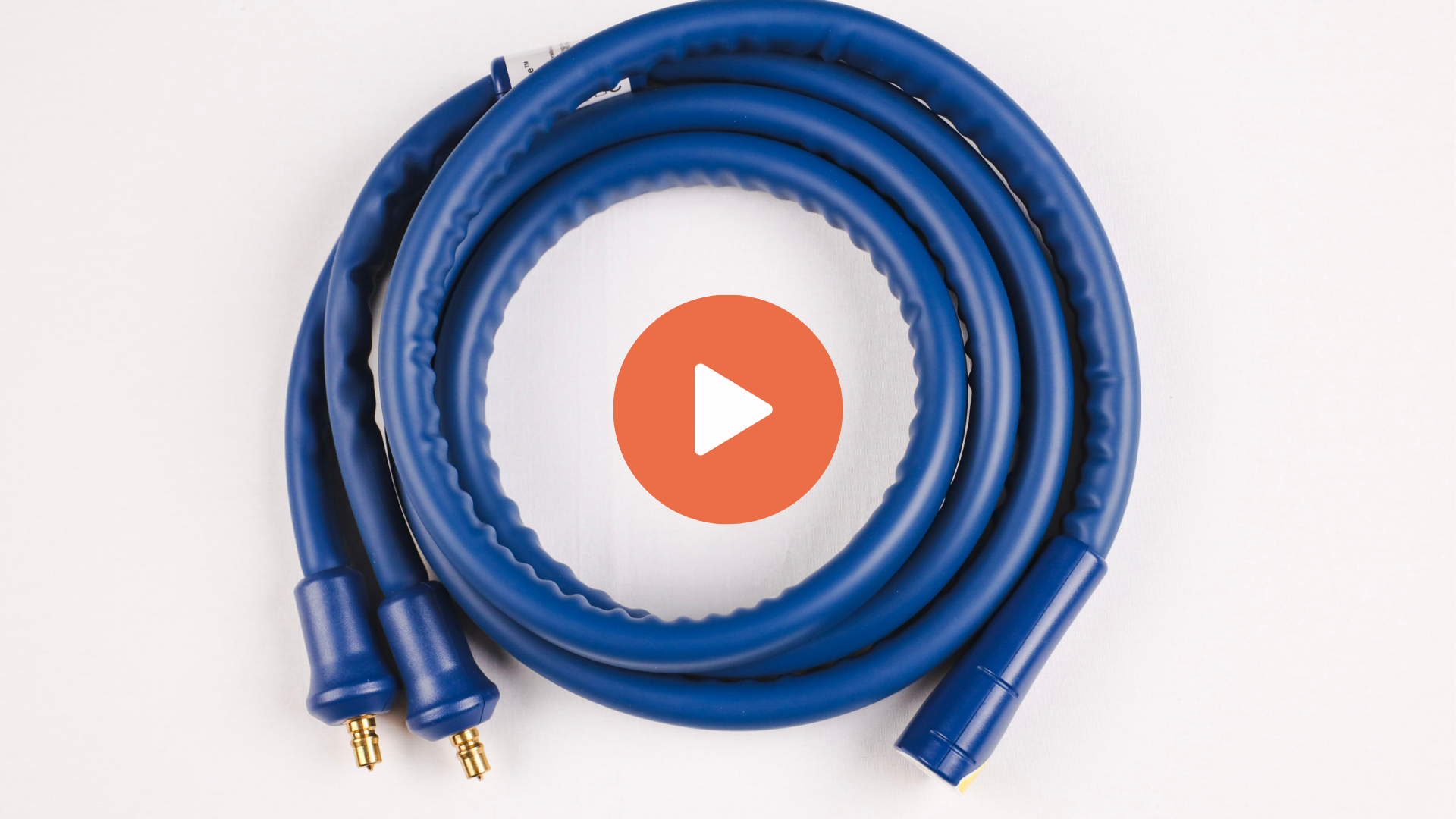 A insulated dual-lumen fluid delivery hose with quick-connect fittings, designed to circulate temperature-controlled water between the Altrix console and the patient wrap