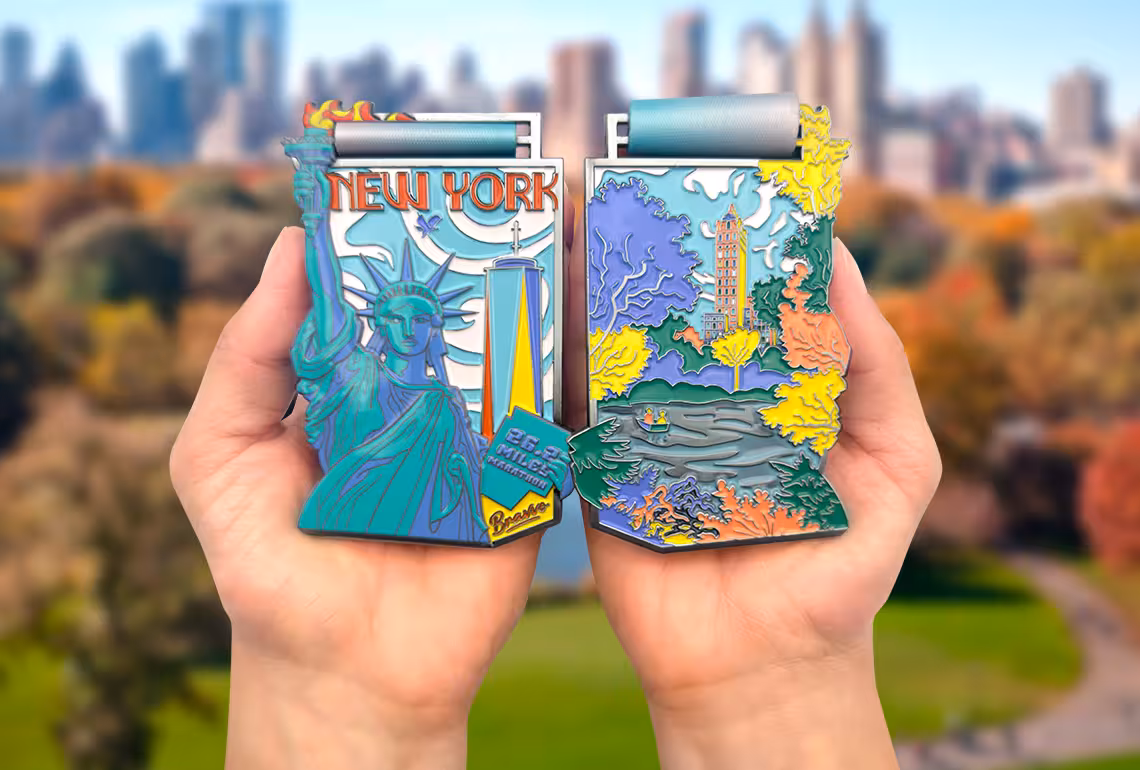 New York Marathon Medal front and back in the hands