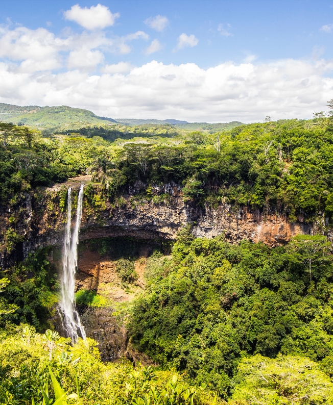 Panoramic view of the colorful lands of Chamarel with MJ Holidays in Mauritius.