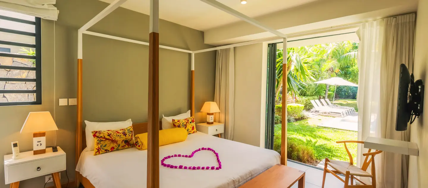 The romantically decorated room at MJ Holidays offers an intimate and elegant atmosphere.