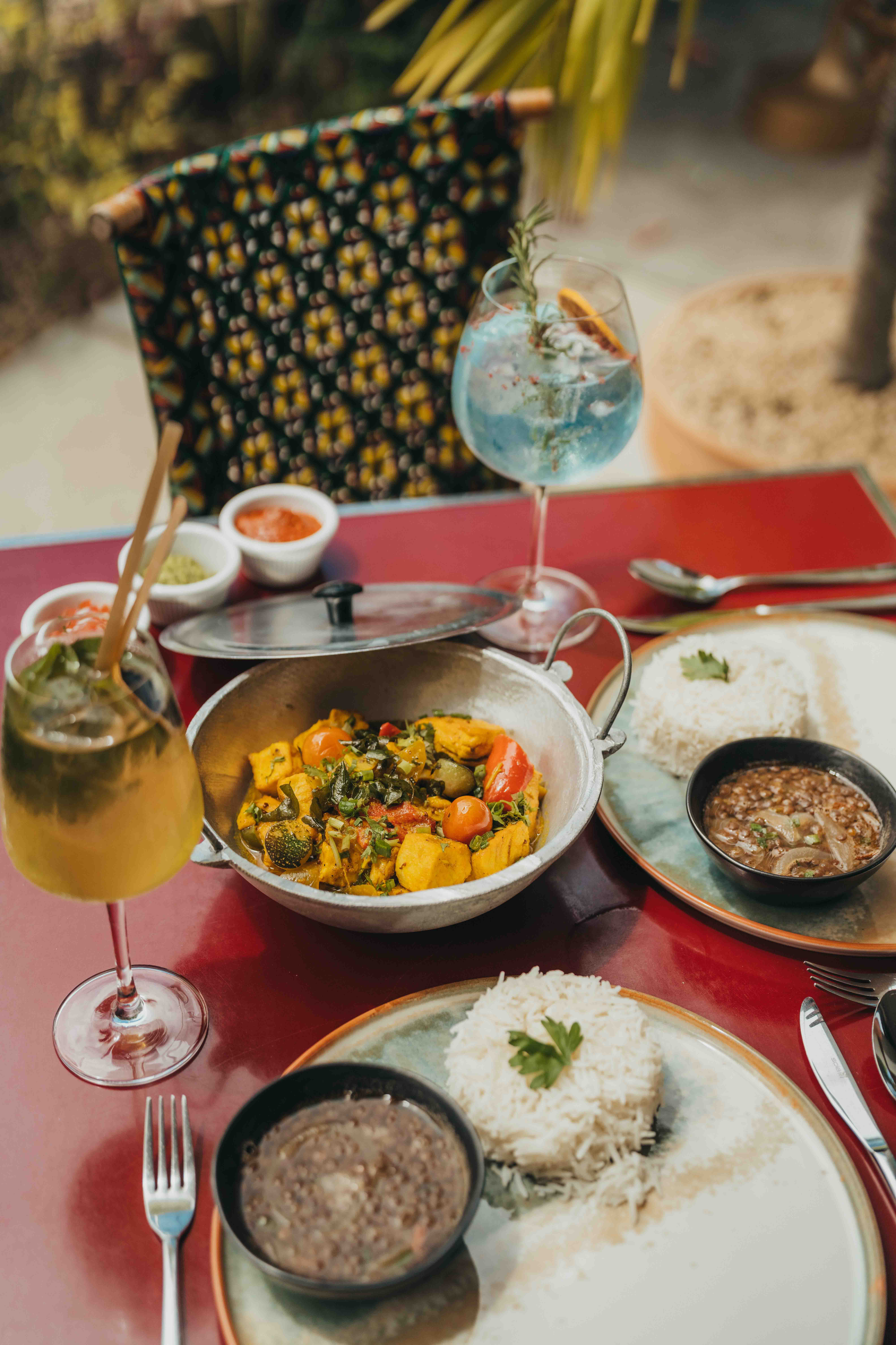 Customer photographing his dish at the Restaurant L'Atelier with MJ Holidays in Grand-Gaube.