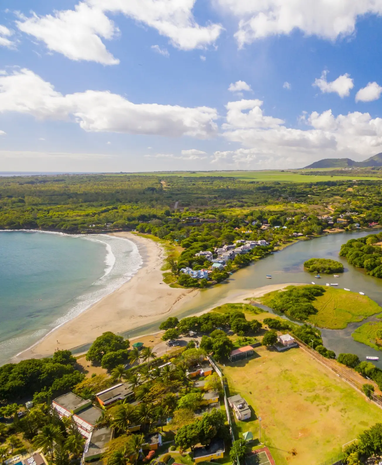 Sky view over Tamarin Bay and its blue lagoons with MJ Holidays in Mauritius.