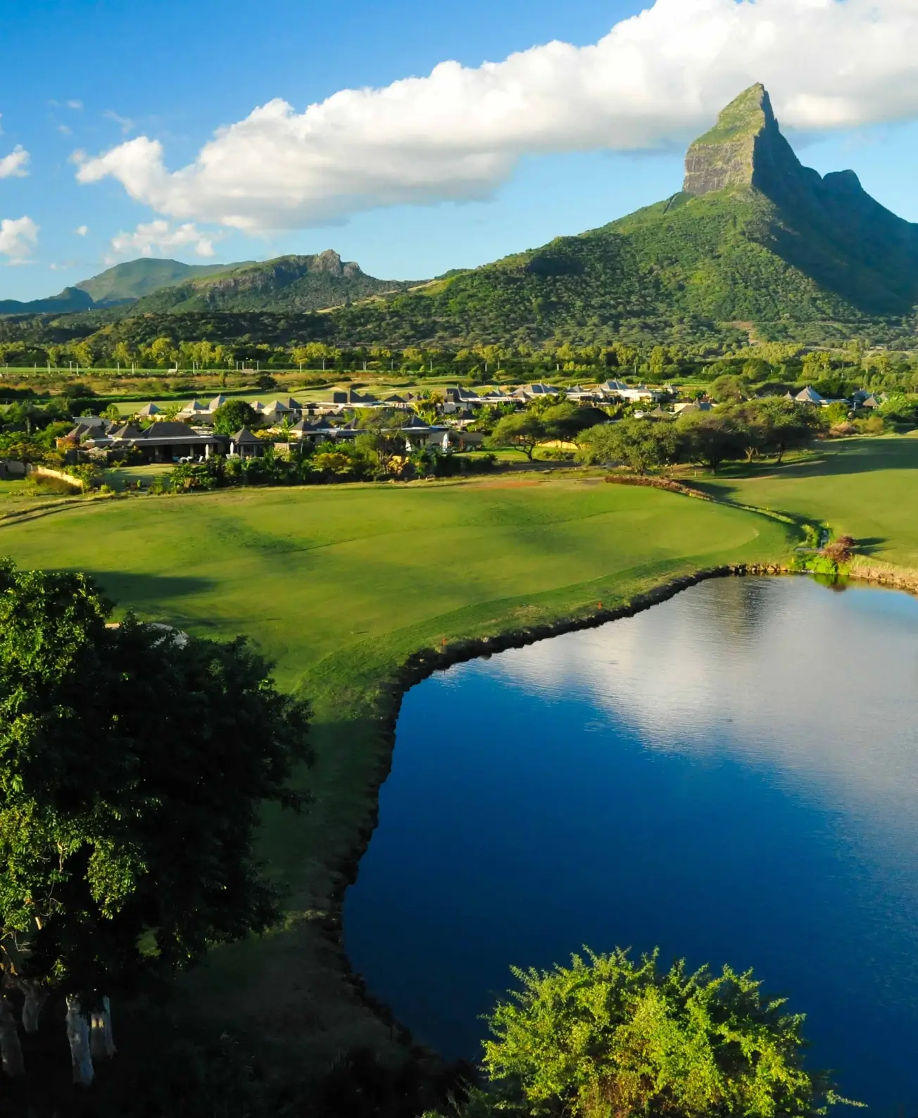 Green golf course by the sea in Mauritius with MJ Holidays.