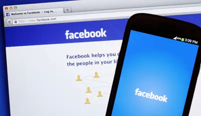 An image of Facebook's website and app