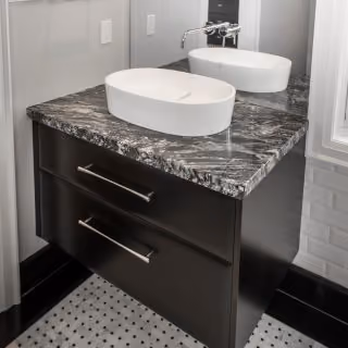 Bathroom tile and fixture detail from a Pioneer Craftsmen renovation
