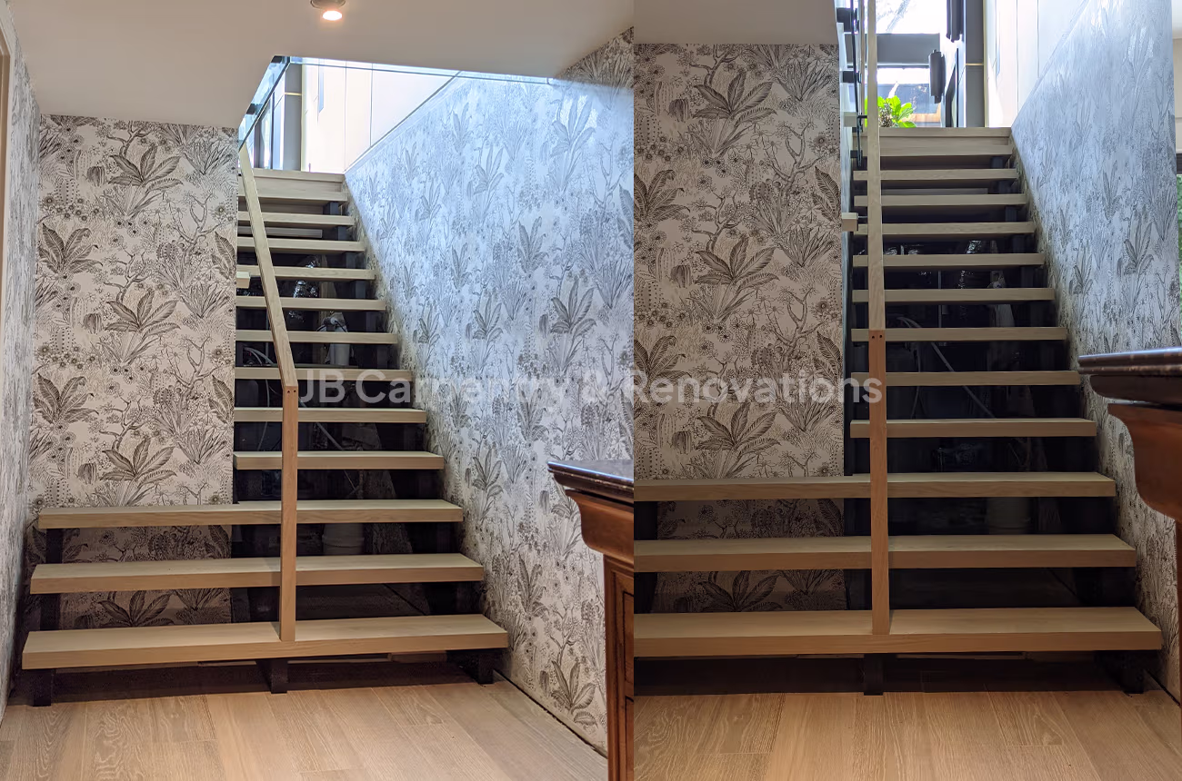 Open staircase with patterned wallpaper walls – Contemporary staircase with light wood treads, black stringers, and botanical wallpaper accent walls.