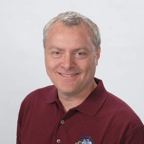 Photo of man in maroon button down polo. Tim Walters, real estate broker & owner of The Homebuyers; MN Buyers Agent.