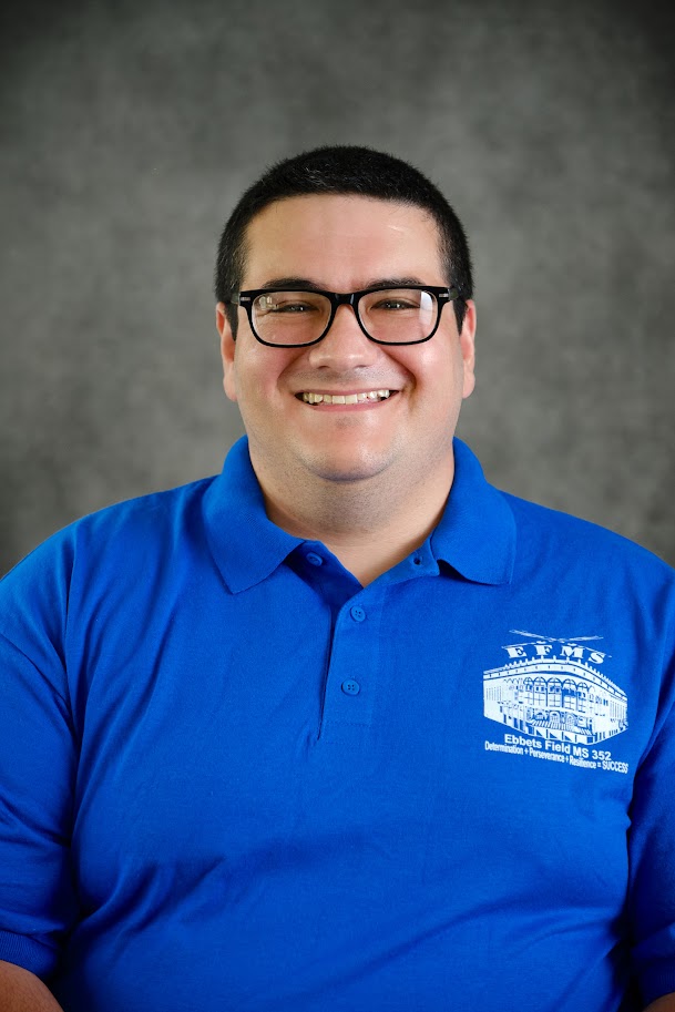 Staff member Steven Lima in blue school polo