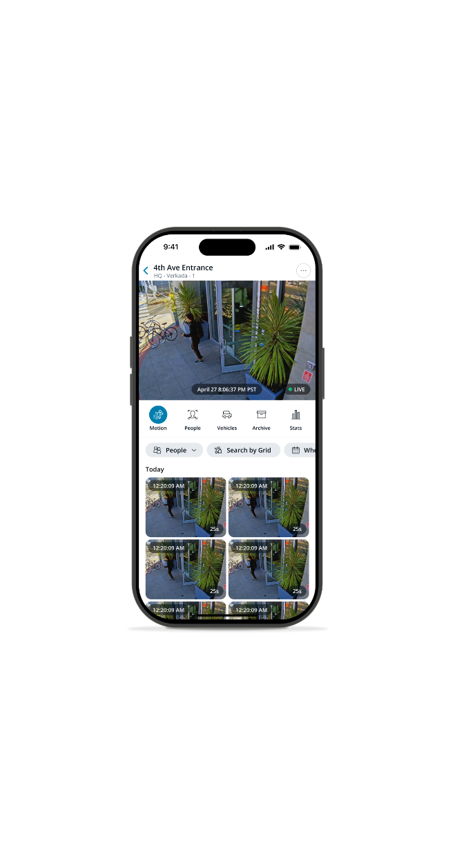 Smartphone displaying live security camera feed of a person walking near an entrance with motion and people filter options.