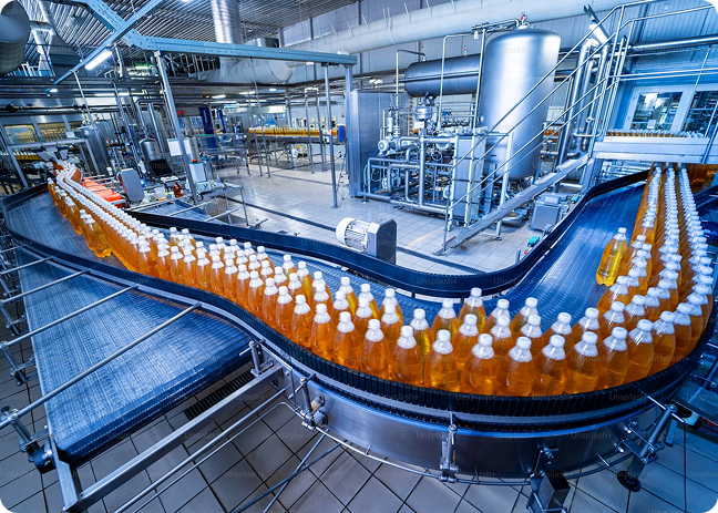 Machinery inside of a manufacturing plant that is producing a bulk amount of product