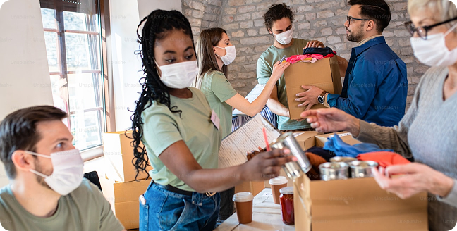 People at a non-profit collecting food donations for those in need