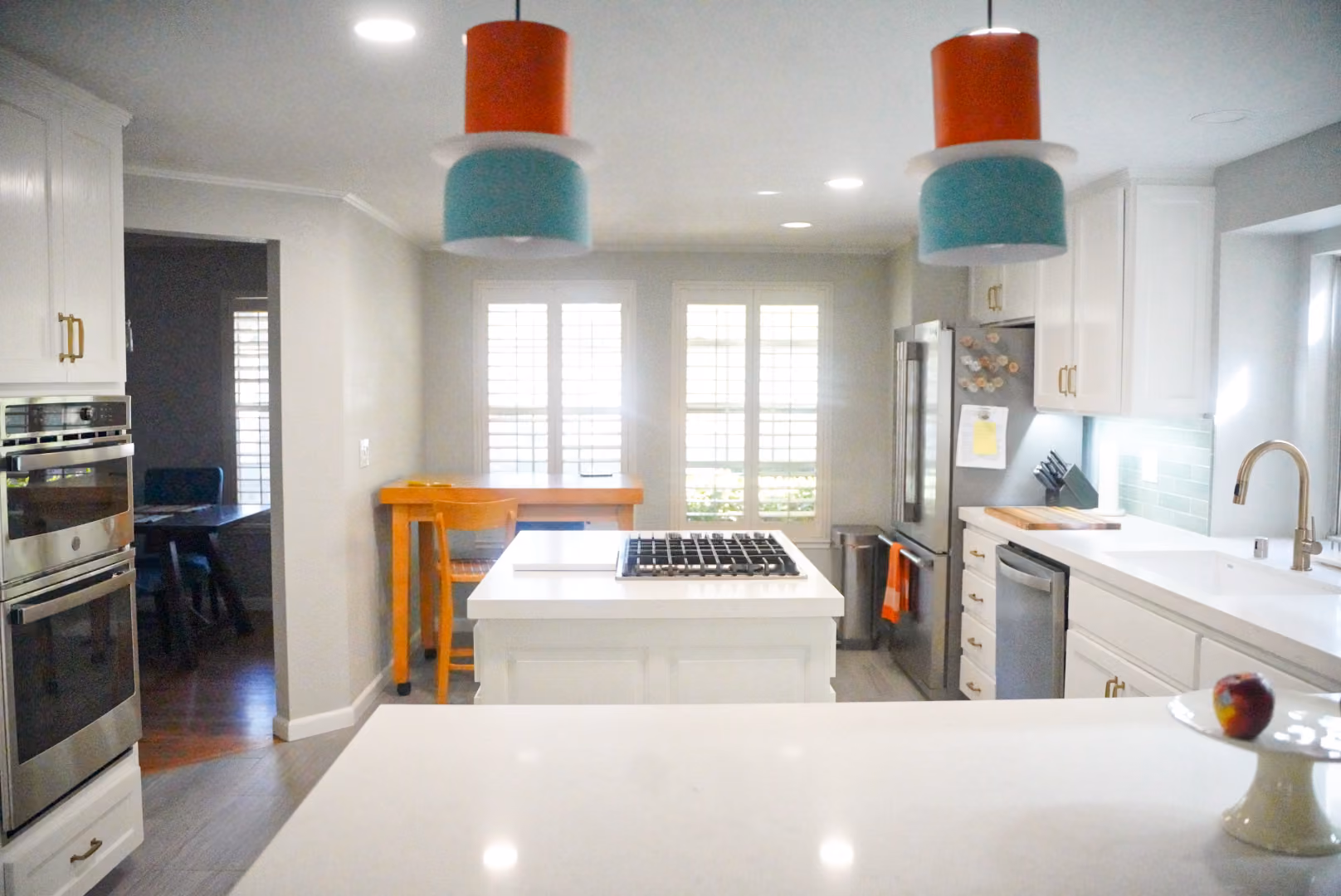 Kitchen remodel in Modesto by kitchen & bath CRATE – lighting, kitchen island, cabinets, appliances, countertops, quartz