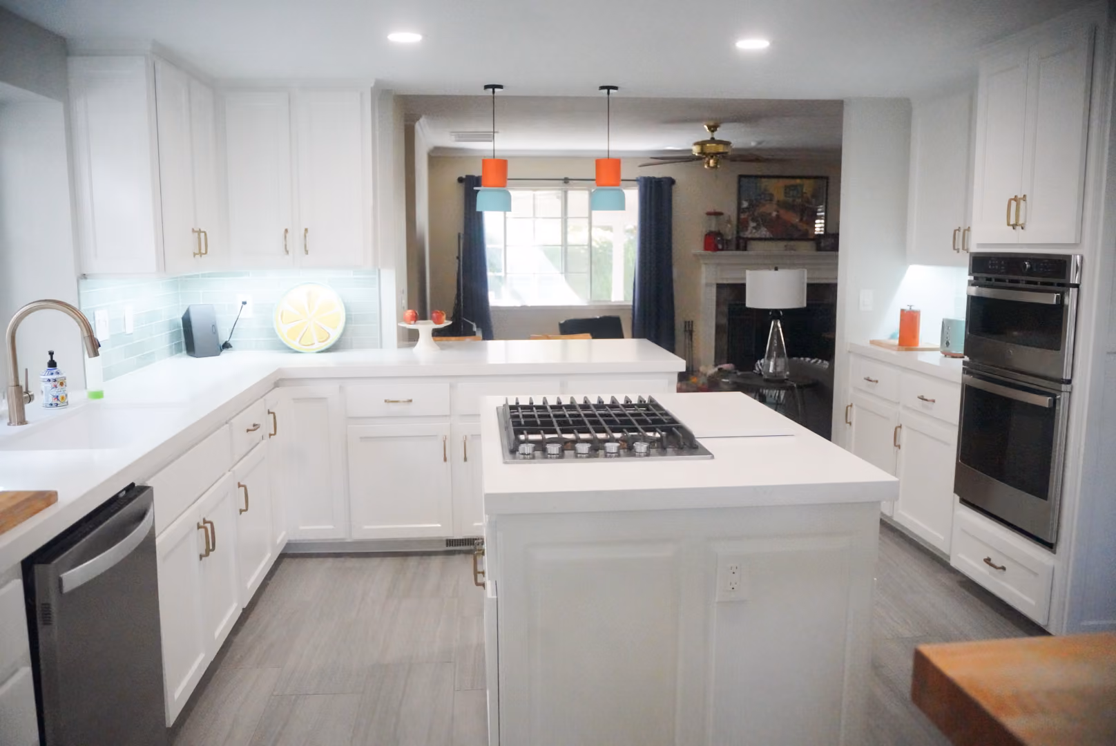 Kitchen remodel in Modesto by kitchen & bath CRATE – cabinets, kitchen island, countertops, backsplash, lighting, appliances, flooring
